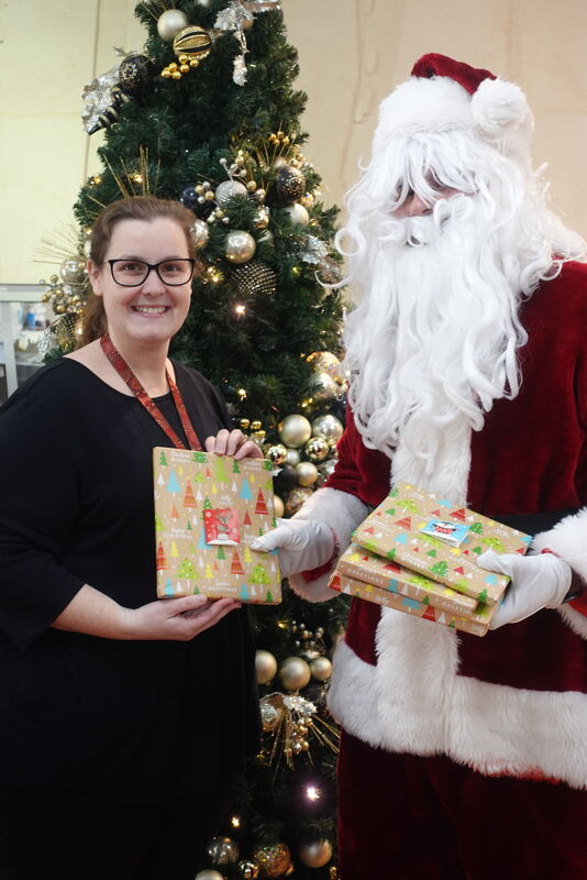 Children’s and Youth Services Library Officer Bek Coates with Santa.