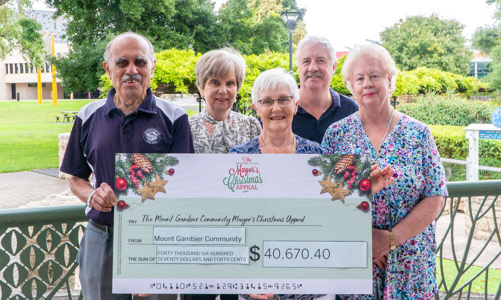 St Vincent de Paul representative John D’Souza (left), Mayor Lynette Martin, Uniting Care representative Laura Kilsby, Salvation Army representative John Douglas , and Lifeline representative Bronwyn Martin with a cheque for the total donation amount of more than $40,000 to the Mount Gambier Community Mayor's Christmas Appeal.