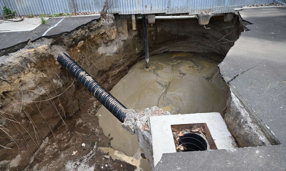 A stabilised sand mix was pumped into the sinkhole cavity.