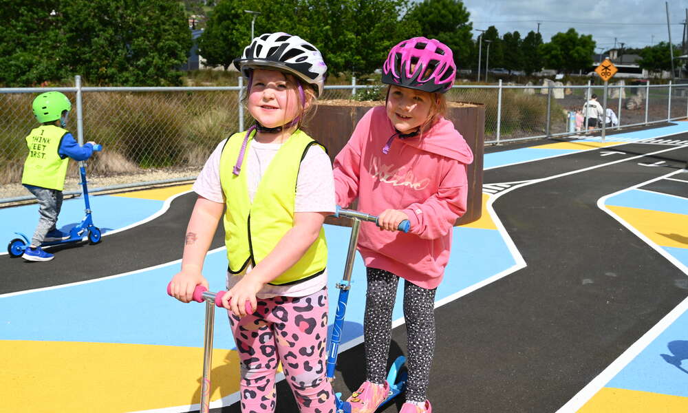 Rory and Harriet had fun negotiating the mini streetscape on their scooters.