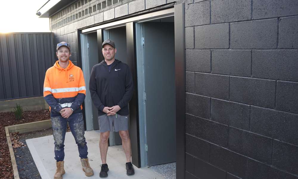Mount Gambier and District Cricket Association President Robert Drenthen (right) and executive member and Mil Lel player Jack Miller inspect the new changeroom facilities.