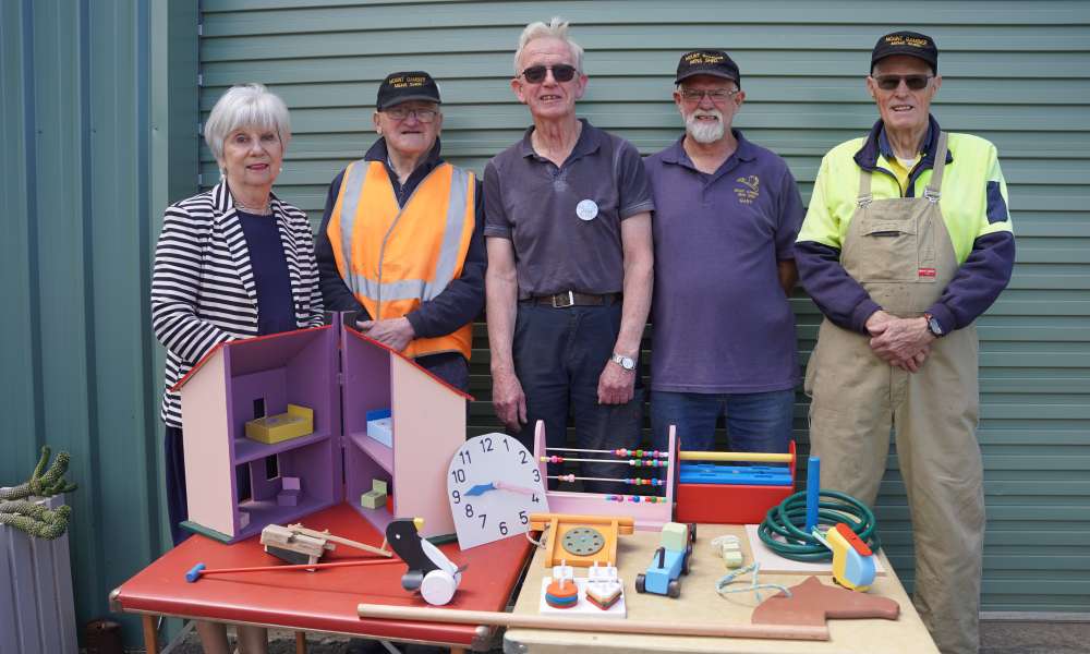 Mayor Martin is pictured with Mount Gambier Men’s Shed volunteers George Renzi (left), Jim Grant, Gary Austin and Ian Bond, the team responsible for crafting 150 toys for distribution as part of the Mount Gambier Community Mayor’s Christmas Appeal.