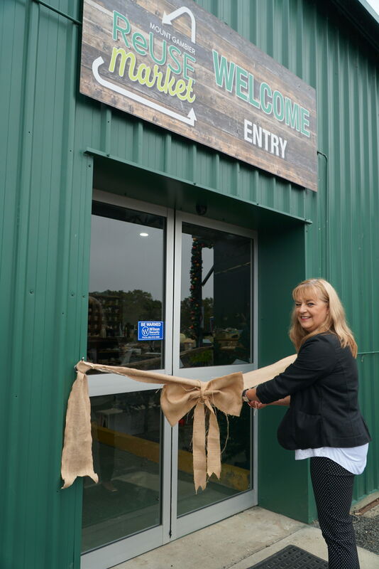 Deputy Mayor Sonya Mezinec cuts the ribbon to officially open the Mount Gambier ReUse Market.