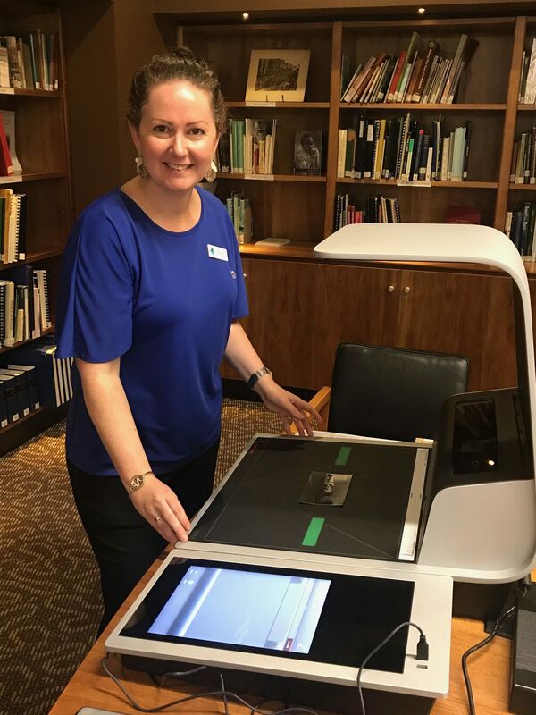 Local History Officer Danni Reade with the new Zeta Digital Scanner sponsored by OneFortyOne.