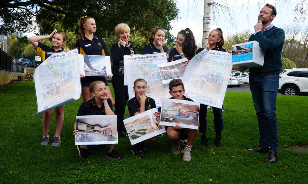 Reidy Park Year 7 Leadership Team members Mackye, Leila, Bree, Millie, Taylor, Lara, Ruby and Amity think about potential names for the Mount Gambier Community and Recreation Hub with Mayor Lynette Martin and Regional Sport and Recreation Committee  Presiding Member Cr Ben Hood.