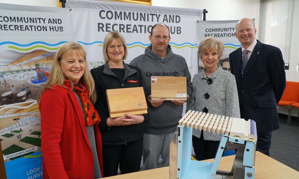 City of Mount Gambier Councillor Sonya Mezinec (left), Community Reference Group members Yvette Holmes and Scott Martin alongside Mayor Lynette Martin and CEO Andrew Meddle with material samples for the courts and aquatics facilities for the Community and Recreation Hub project.