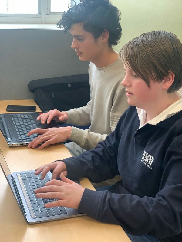 Seb McCarthy and George Comley (Team SG) busy hacking datasets around disabled parking.