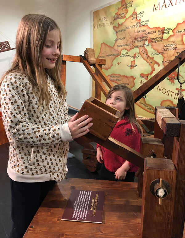 Stella and Astrid check out the Ancient Rome: The Empire that Shaped the World exhibition in readiness for the School Holiday Program at the Mount Gambier Library and The Riddoch & Main Corner Complex.