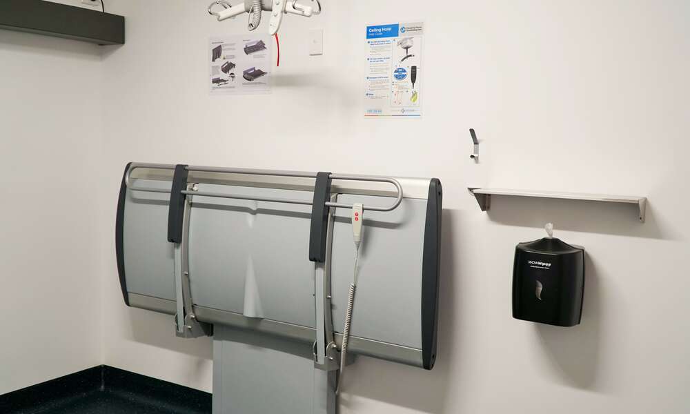 The Changing Places facility includes a range of features not available in standard accessible toilets such as a height adjustable adult sized change table, a tracking hoist system, non-slip flooring and space to accommodate a person using a wheelchair and up to two carers.
