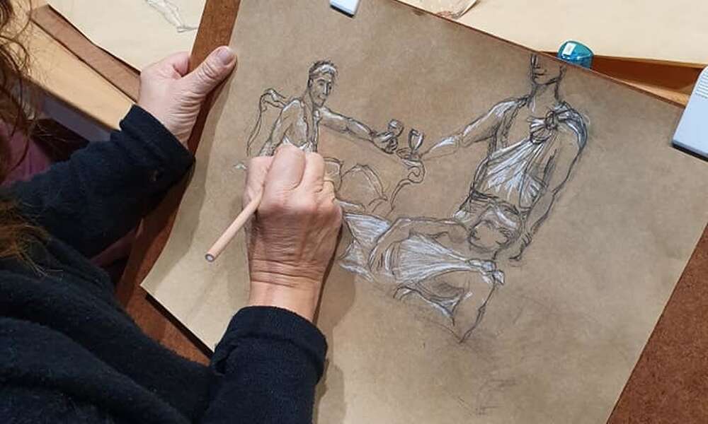 The community is invited to try a hand at a toga life drawing session with local artists as part of the program.