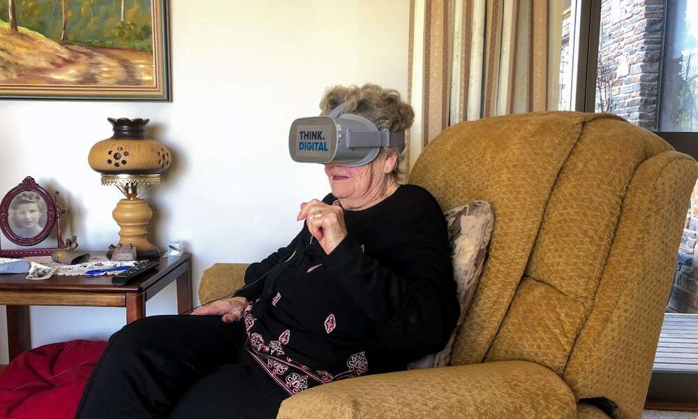 Mount Gambier resident Noela Hellyer experiencing local stories in VR thanks to the library's Immersive Storytelling project