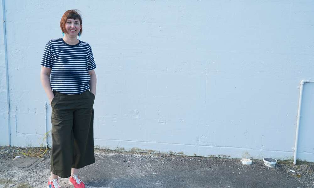 Artist April Hague stands next to the blank wall on Heriot Street that will be transformed with 10 portraits as part of ‘The Portrait Project’ by the middle of next year.