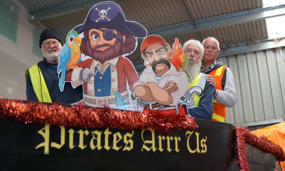 Event volunteers Mike Scutter (left), Alan Liptrott and Greg Muller on the revamped Pirates Arrr Us float.